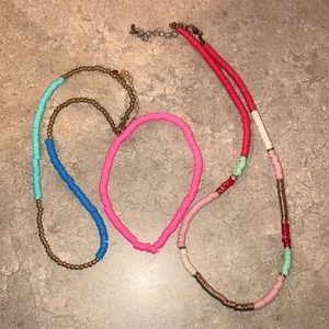 Two necklaces and one anklet